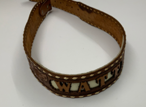 Image of Belt, w/ lettering "WATT"