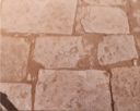 Image of Three Link Brand in Stone Floor of Bunkhouse