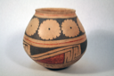 Image of Ramos Polychrome jar with interlocking scrolls and bull's eye design