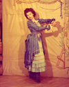 Image of Margie Sedwick Bray in Blue Costume